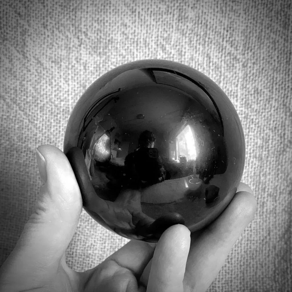 Large Genuine Black Shungite Sphere 75mm in Carved Selenite Bowl